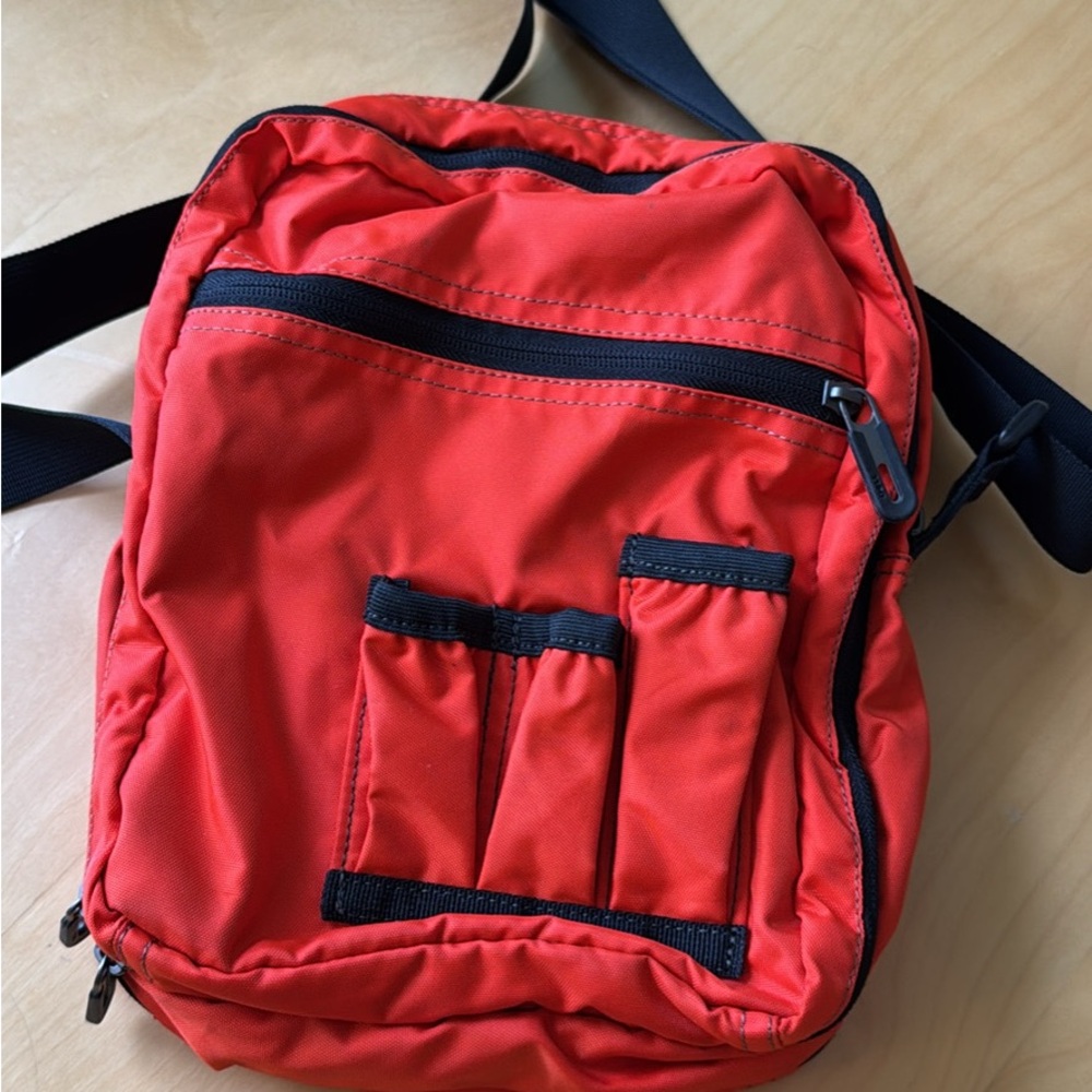 Red-orange tech bag